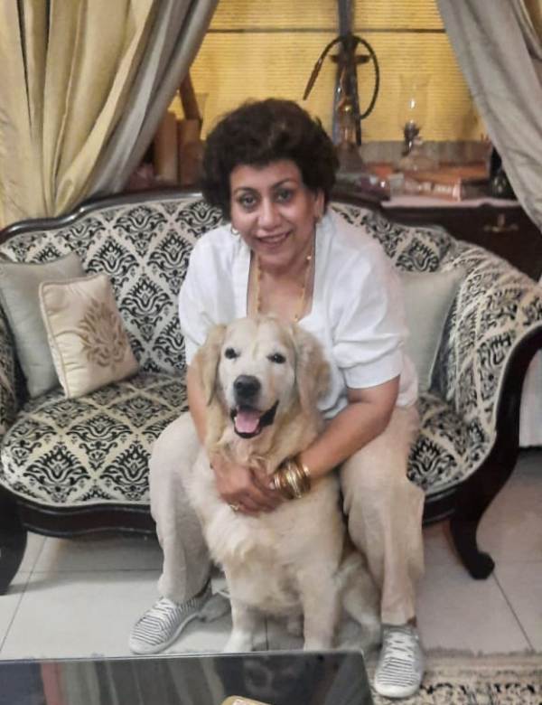 Rini Simon Khanna with her dog