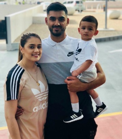 Safyaan Sharif with his wife and child