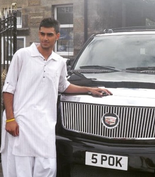 Sharif Safyaan posing with his car