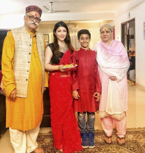 Shivani Sen with her parents and son