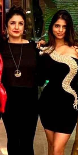 Suhana Khan wearing her black Balmain Dress at a party