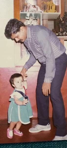 A childhood photo of Spandana Vijay Raghavendra with her father