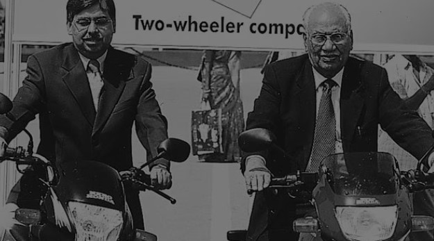 An old picture of Pawan Munjal (left) with his father while riding bikes