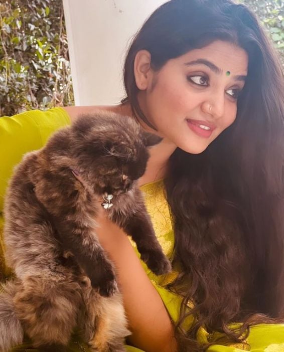 Anshitha with a cat