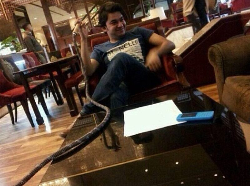 Asad Abbas smoking hookah at a resort