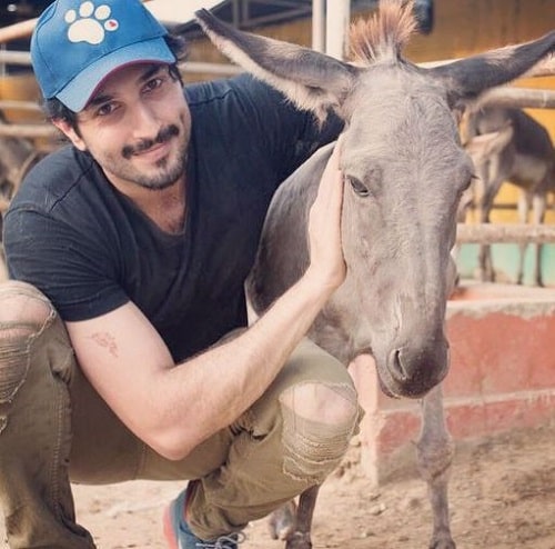 Bilal Ashraf with a donkey