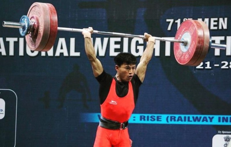Chanambam Rishikanta Singh during a weightlifting competition