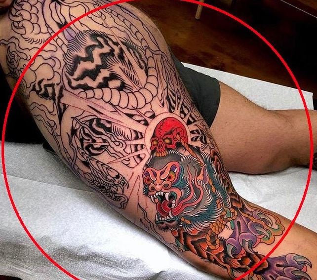 Combination of Animals on his left thigh