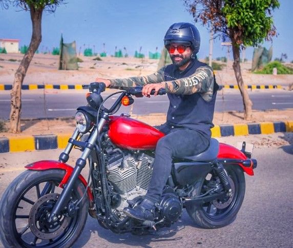Faizan Sheikh driving his Harley Davidson bike