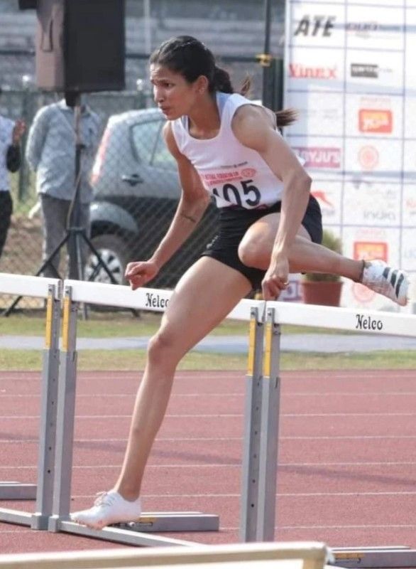 Jyothi Yarraji during a 100 metres hurdle race
