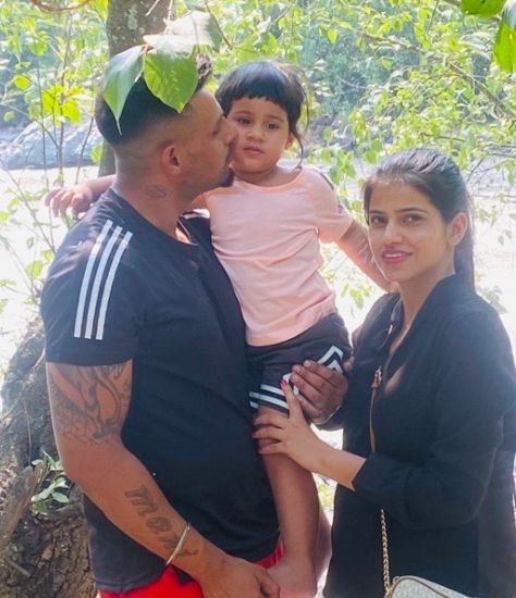 Maninder with his daughter and wife