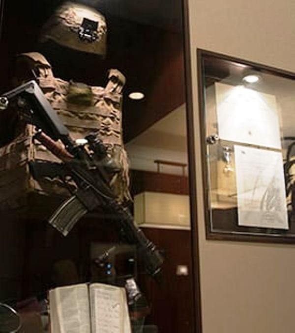 Matthew's battle gear displayed in a museum