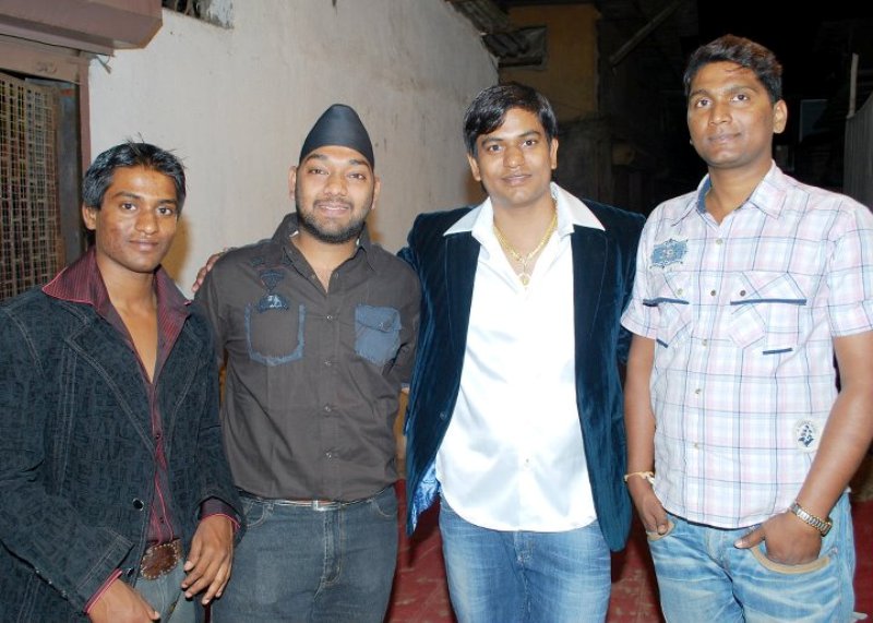 Mukesh Sahani (second from right) with his younger brother, Santosh Sahani (left) and friends during his days in Mumbai