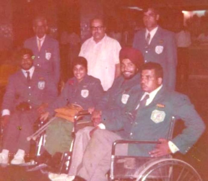 Murlikant Petkar with other players while leaving for the International FESPIC Games in Hong Kong