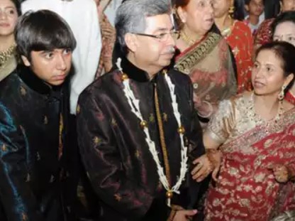 Pawan Munjal with his son and wife