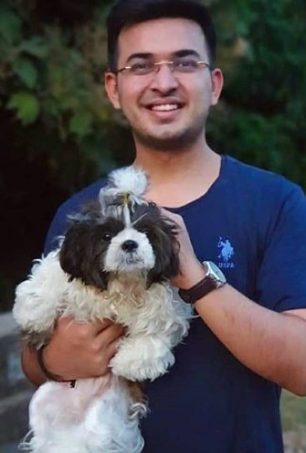 Shubhankar Mishra with a dog
