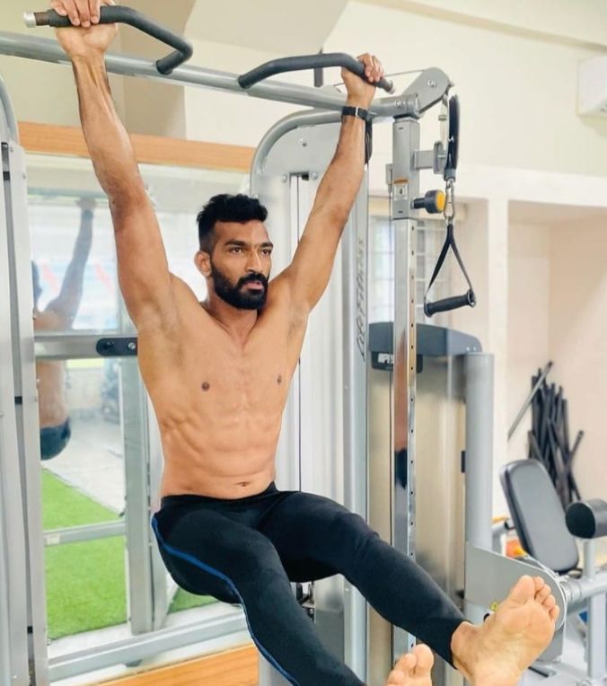 Sukesh Hegde working out in the gym