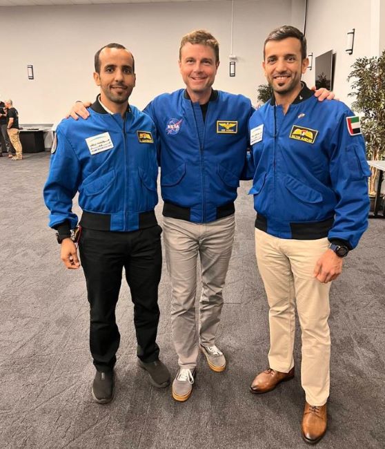 Sultan Al Neyadi (right) with other astronauts