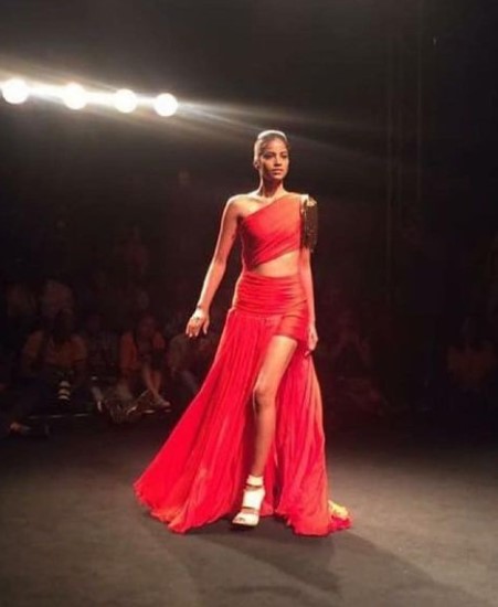 T J Bhanu while walking a ramp for an Indian designer