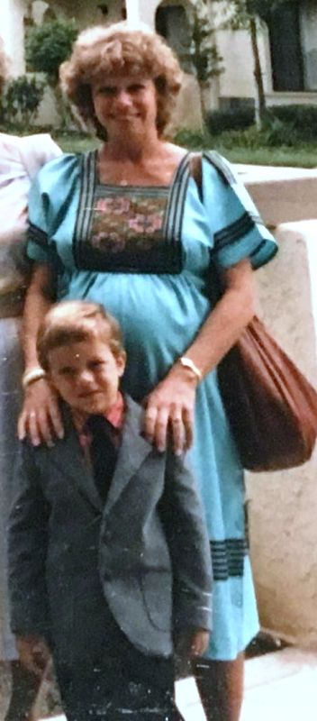A photo of young Dan with his mother