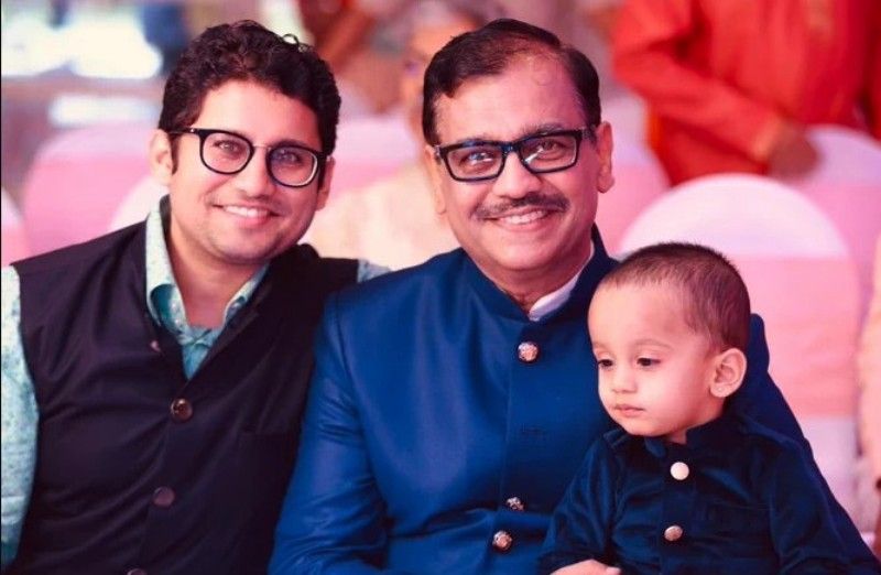 Aniket Nikam with his father and son