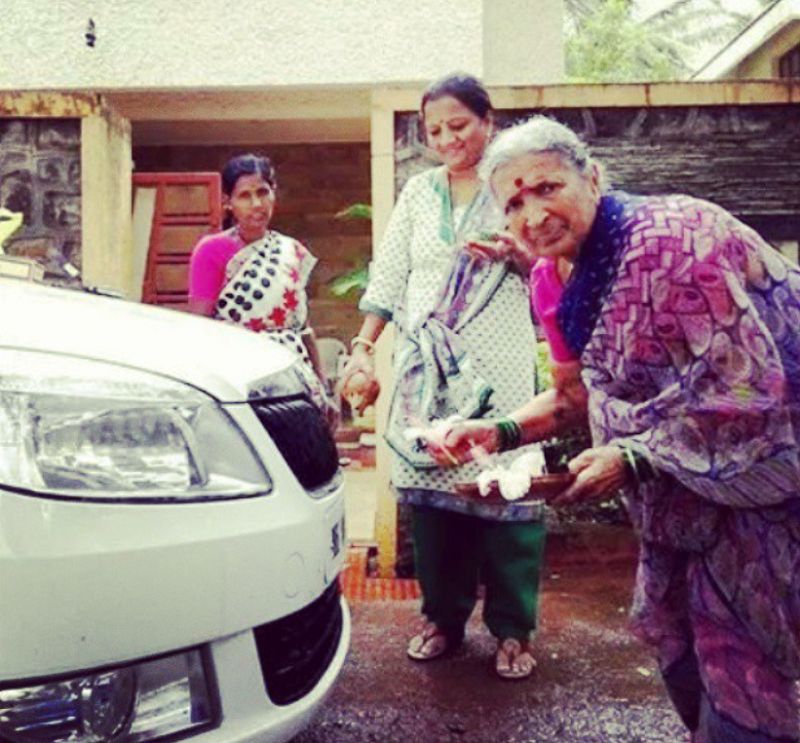 Bharat Jadhav's mother performing a pooja on his scoda car