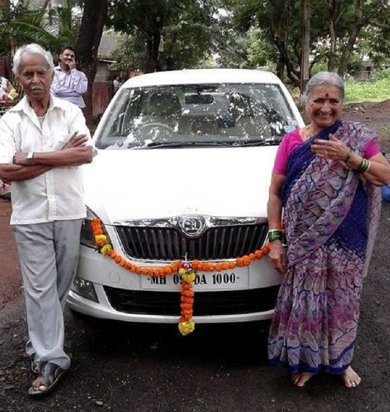 Bharat Jadhav's parents posing with his Scoda Rapid car