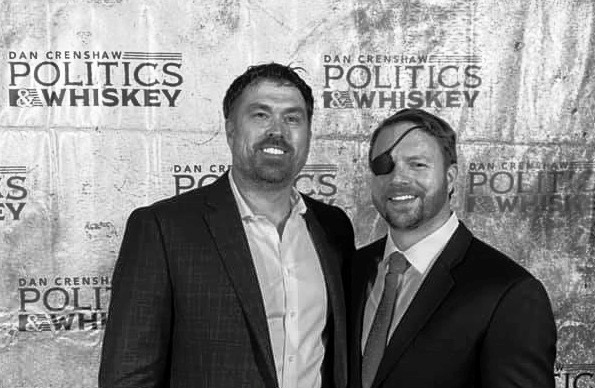 Dan Crenshaw posing for a photo with Morgan Luttrell during an event