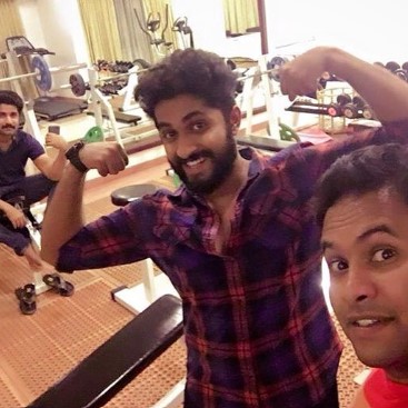 Dhyan Sreenivasan while posing at a gym