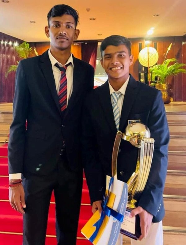 Dunith Wellalage (right) with Schoolboy Cricketer of the Year, Best Bowler of the Year, and Best Allrounder of the Year awards