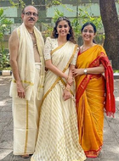 G Suresh Kumar with his daughter and wife