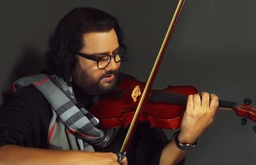 Ismail Darbar playing a violin