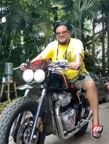 Ismail Darbar with his motorcycle