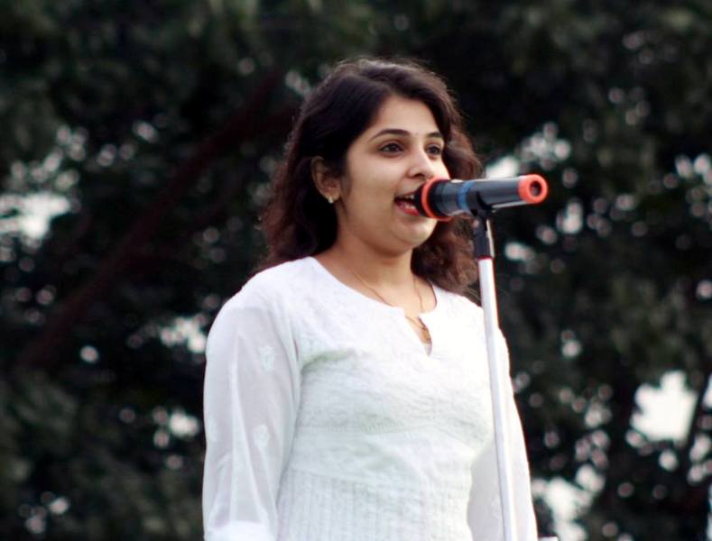 Mounima Bhatla singing during her early singing years