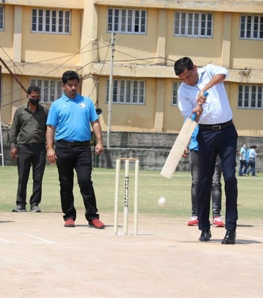 Mukesh Singh playing cricket