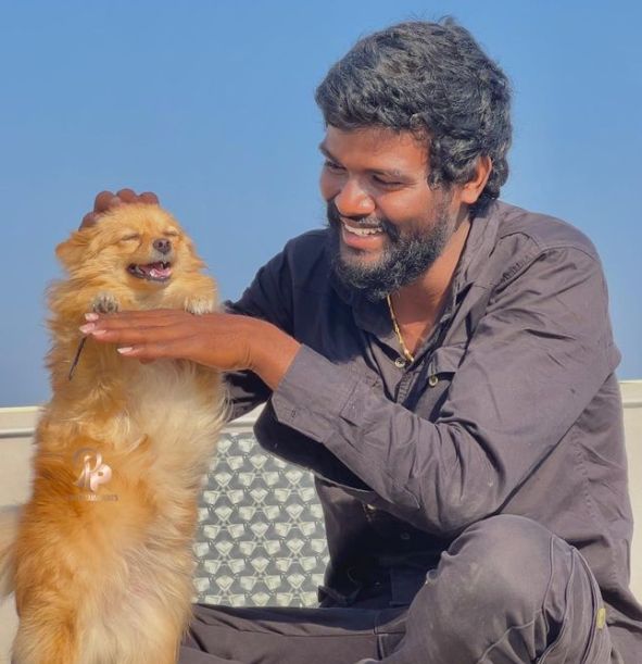 Pallavi Prashanth with a dog