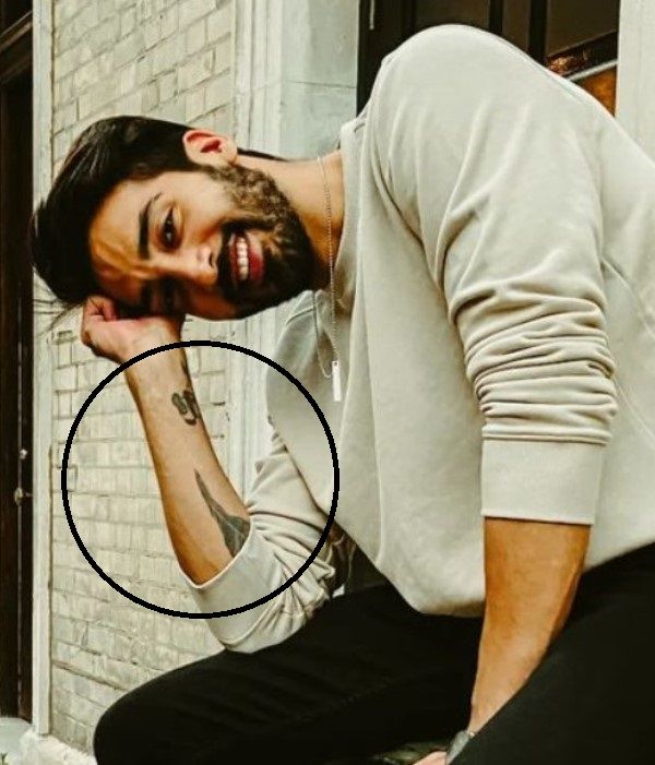 Rohit Raaj's tattoos on his right arm