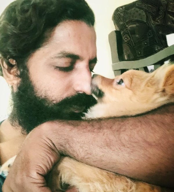 Sanjay Krishna Makthala with his pet dog Akhira