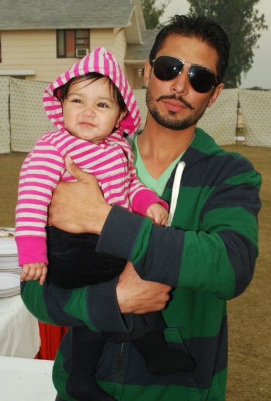 Sukha Duneke with his daughter
