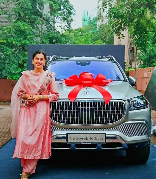Taapsee Pannu while posing with her Mercedes-Benz Maybach GLS 600