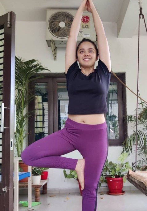 Tarjanee Bhadla while practicing yoga at home