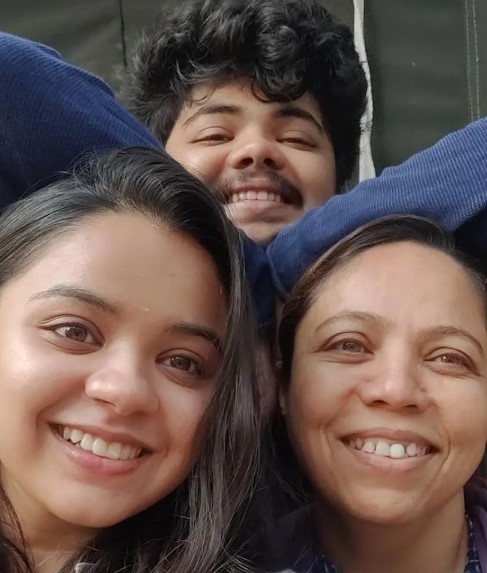 Tarjanee Bhadla with her mother and brother