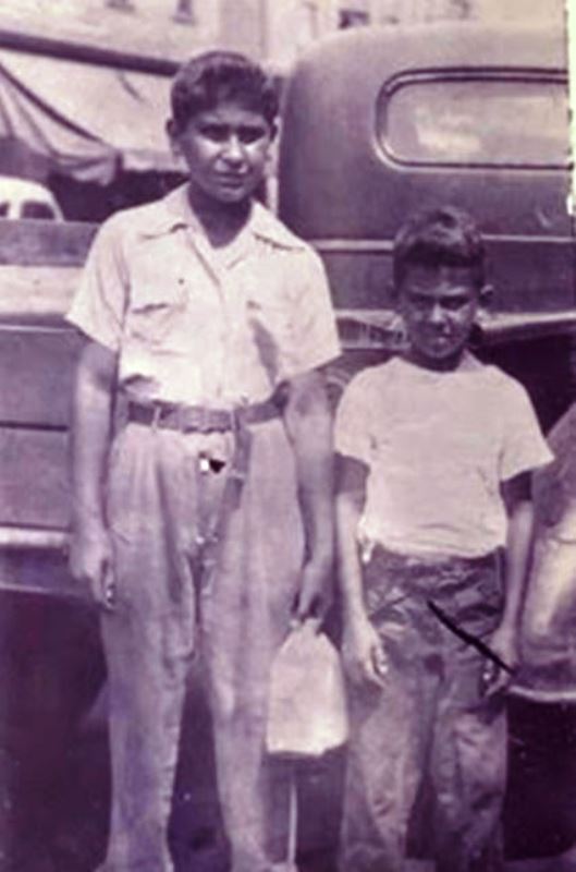 Ten-year-old Frank Caprio, with older brother Anthony, delivering milk