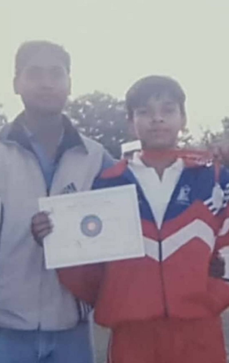 Abhishek Verma with his coach when he started winning national championships
