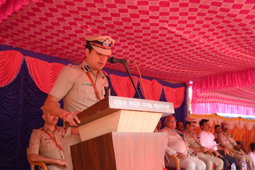 Anupam giving a speech during a police event