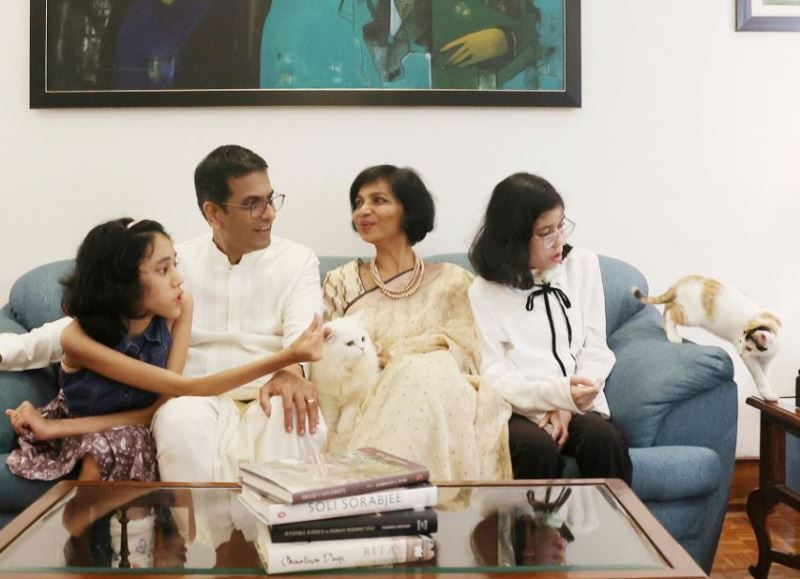 Justice DY Chandrachud with his wife and foster daughters, Priyanka and Mahi