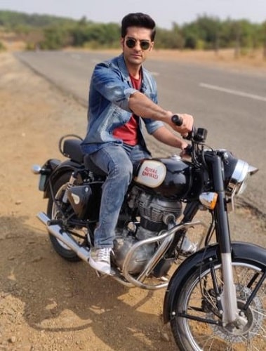 Kunal Thakur with his motorcycle