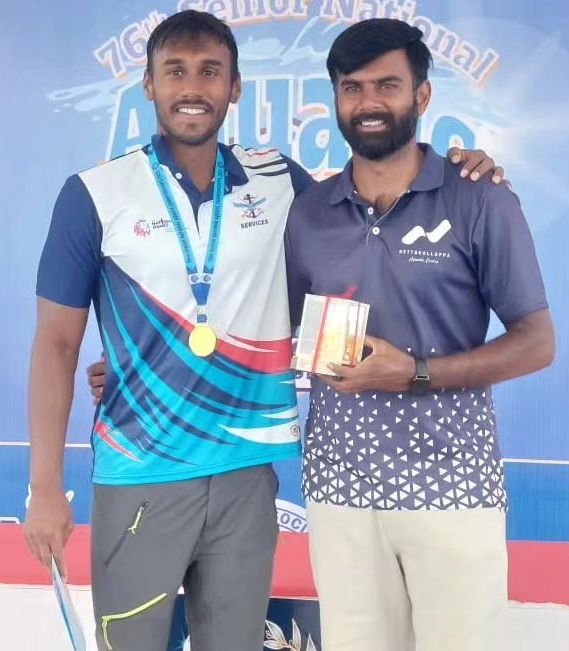 Likith Selvaraj (left) after winning a gold medal in the 76th Senior National Aquatic Championships