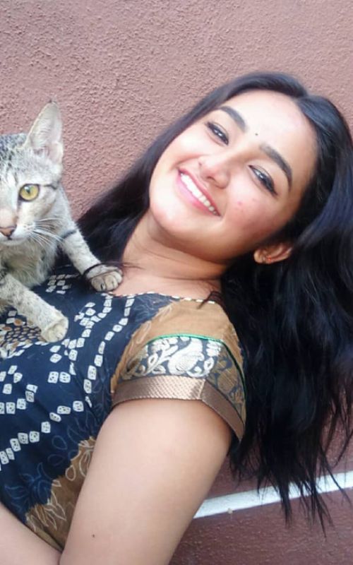Raveena Daha with a cat