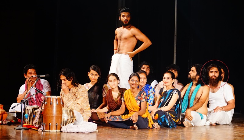 Resty Kamboj (in red circle) in the play Jhopadpatti (2016) by Alankar Theatre Group